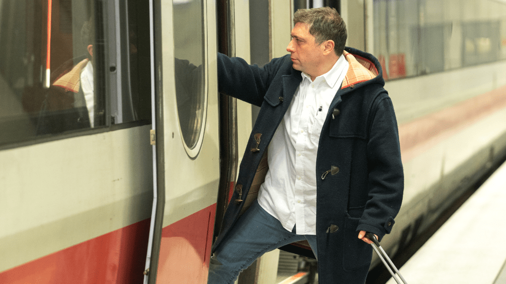 Man boarding a train